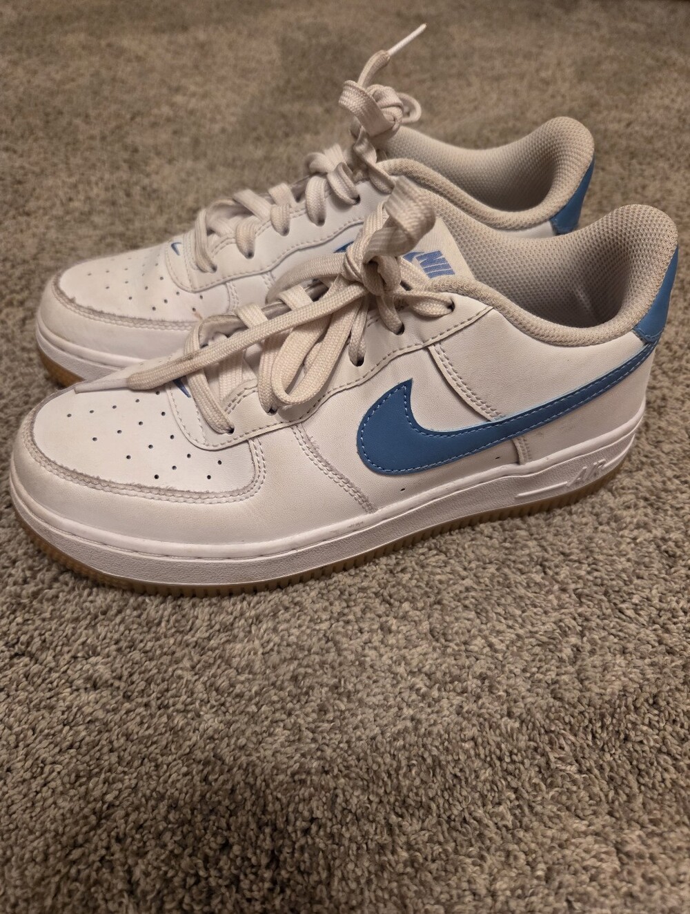 Nike Kids White Sneakers with Blue Swoosh